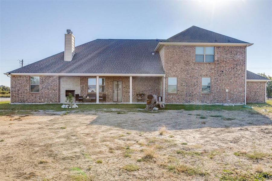 Rear view of house with a patio area