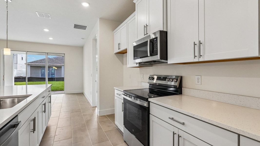 Furnished interior view inside a new home in Trailside, Mount Dora (Image 11).
