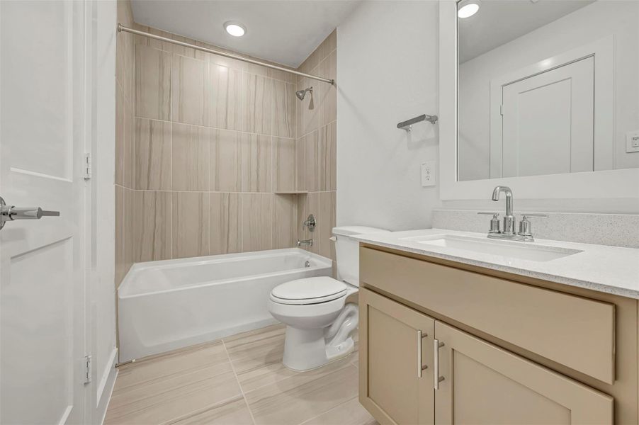 Furnished interior view inside a new home in The Oaks on 6th Street, Magnolia (Image 8).