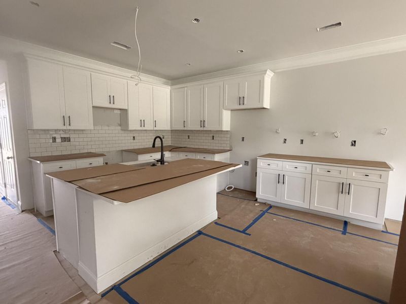 In-progress construction of a new home in Harrisburg Village Townhomes, Harrisburg, NC (Image 6).