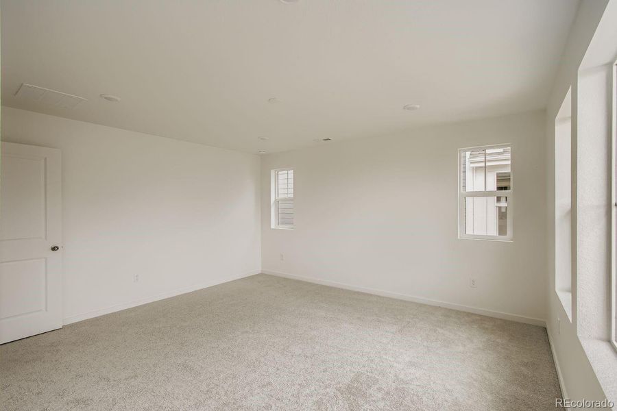 Spacious, unfurnished interior of a new home in Parterre: The Skyline Collection, Thornton (Image 9).