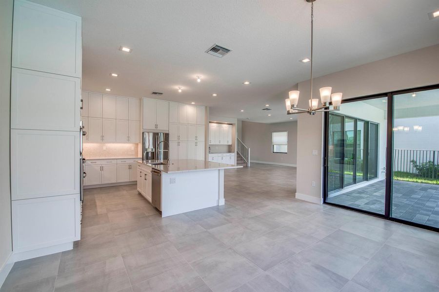 Furnished interior view inside a new home in Apex at Avenir, Palm Beach Gardens (Image 12). Furnished interior view inside a new home in Apex at Avenir, Palm Beach Gardens (Image 12).
