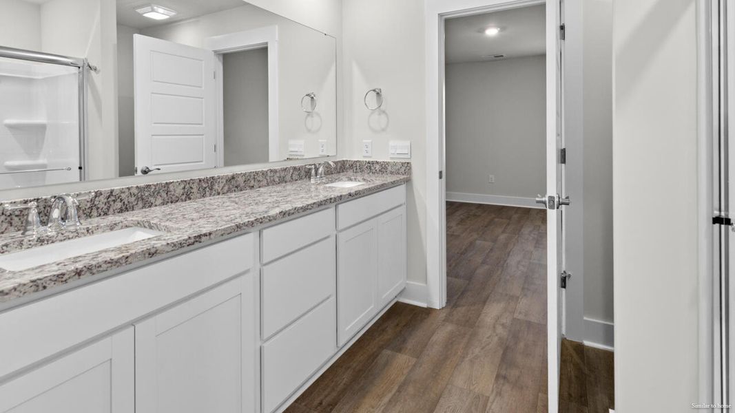Furnished interior view inside a new home in Vineyard Trail, Jacksonville (Image 11).
