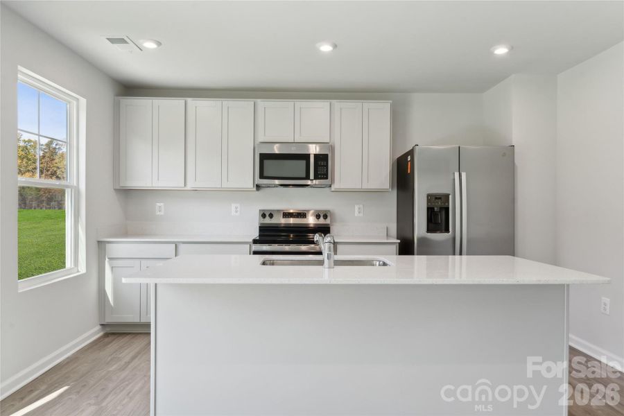 Example Photo Example Photo