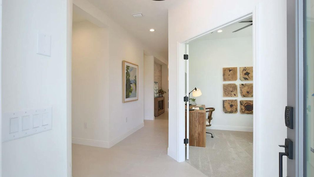 Furnished interior view inside a new home in Boca Royale Golf & Country Club Real Estate and Homes for Sale in Englewood, FL - Neal Communities, Englewood (Image 5). Furnished interior view inside a new home in Boca Royale Golf & Country Club Real Estate and Homes for Sale in Englewood, FL - Neal Communities, Englewood (Image 5).