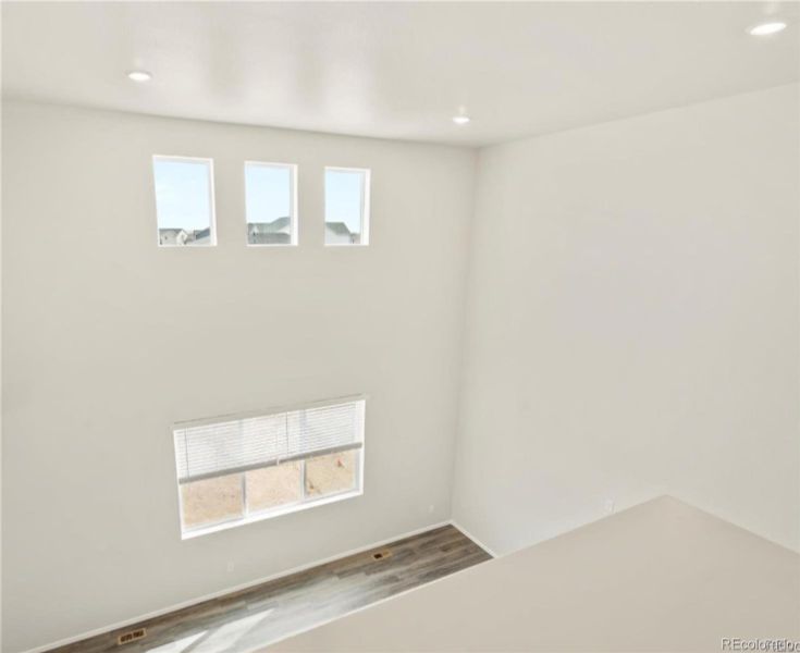 Spacious, unfurnished interior of a new home in Buffalo Highlands: The Flora Collection, Commerce City (Image 12).