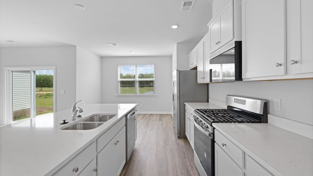 Representative furnished interior of a home built from the SALEM by D.R. Horton in Carolina Groves, Moncks Corner (Image 7).