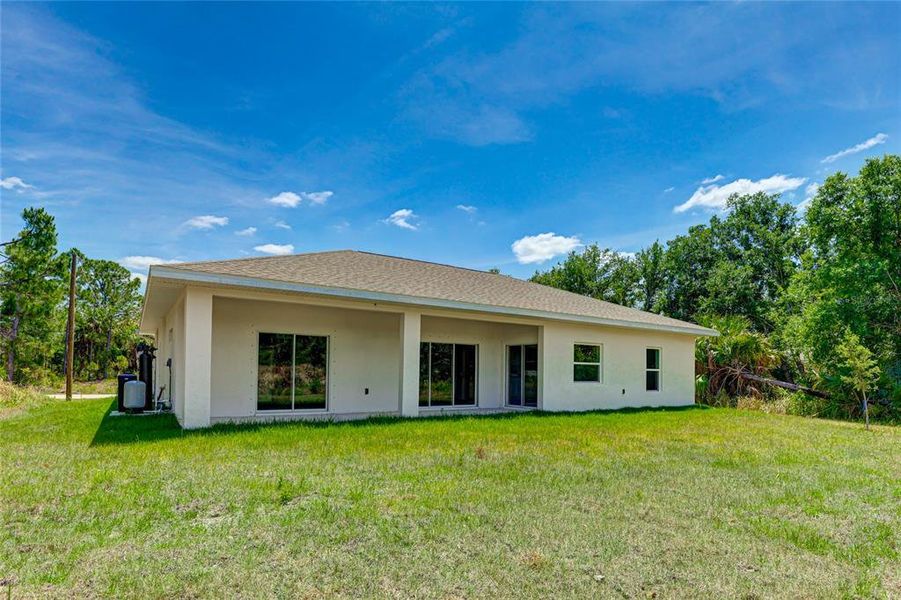 Exterior details and patio area of a home in , North Port (Image 3).