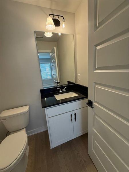 Furnished interior view inside a new home in The Fairways at Mirror Lake, Villa Rica (Image 8).