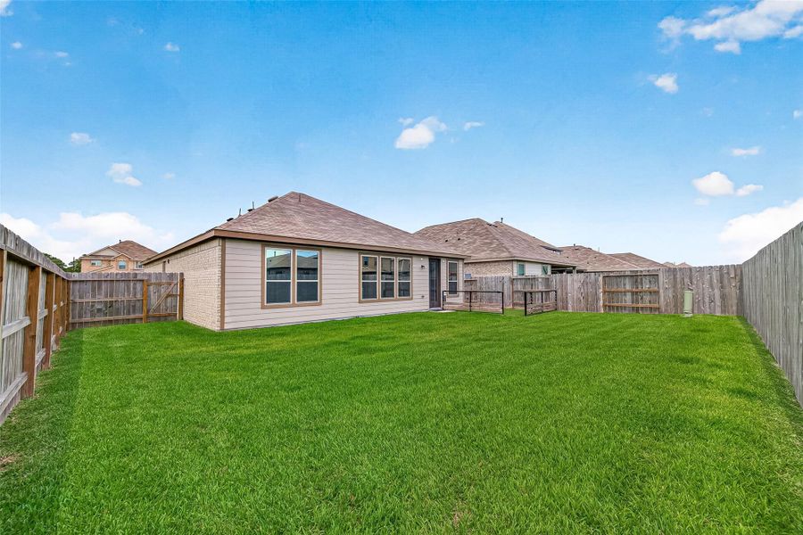 Exterior details and patio area of a home in , Houston (Image 28). Exterior details and patio area of a home in , Houston (Image 28).