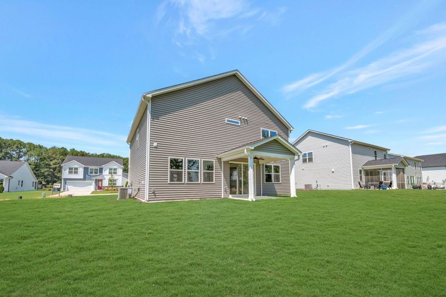 Exterior details and patio area of a home in Providence Creek, Fuquay Varina (Image 3).