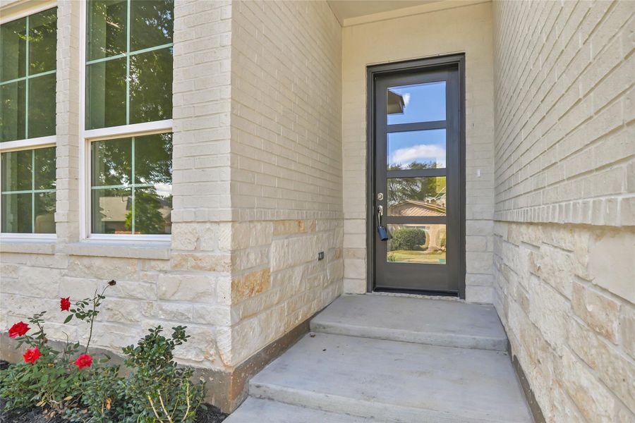 Exterior details and patio area of a home in , Conroe (Image 3).