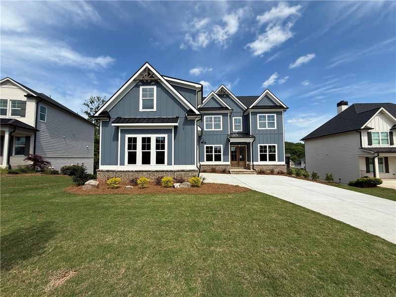Front exterior of a new home in , Jefferson, GA, highlighting curb appeal (Image 24).