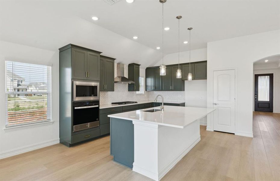 Eat-in kitchen designed with a nice island for dining Eat-in kitchen designed with a nice island for dining