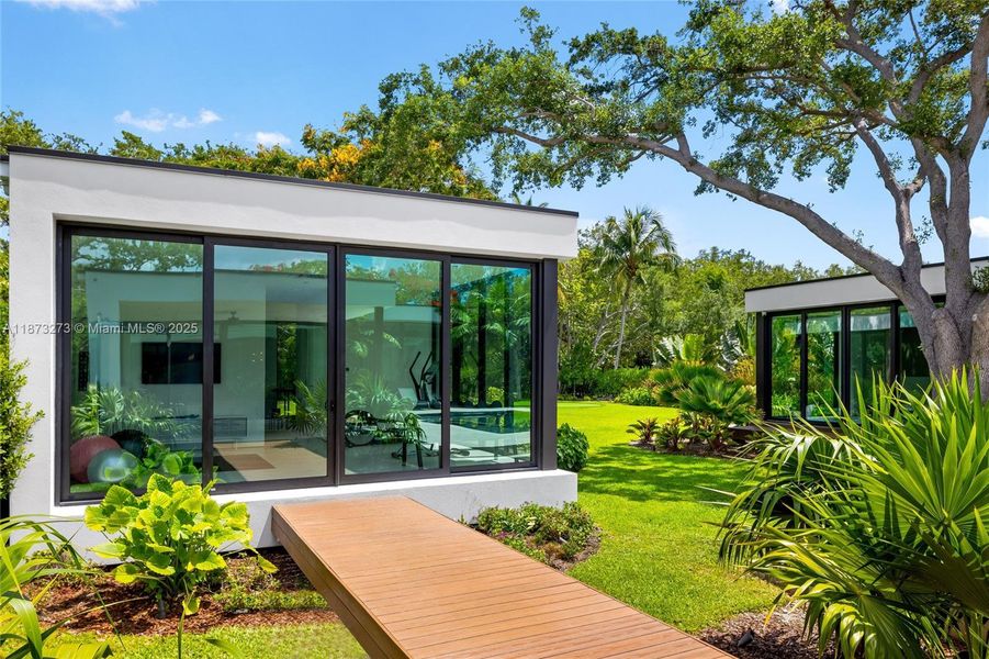 Front exterior of a new home in , Pinecrest, FL, highlighting curb appeal (Image 35).