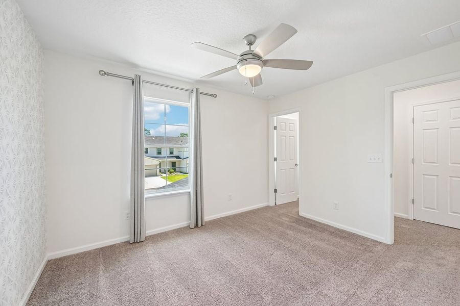 Spacious, unfurnished interior of a new home in Orchard Park Townhomes, St. Augustine (Image 19).