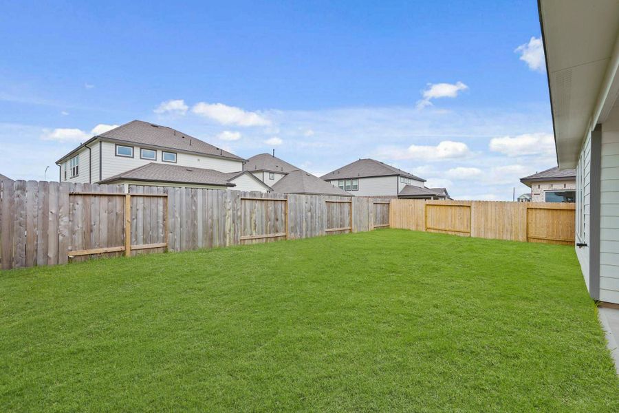 Front exterior of a new home in Huntington Place, Rosharon, TX, highlighting curb appeal (Image 18). Front exterior of a new home in Huntington Place, Rosharon, TX, highlighting curb appeal (Image 18).