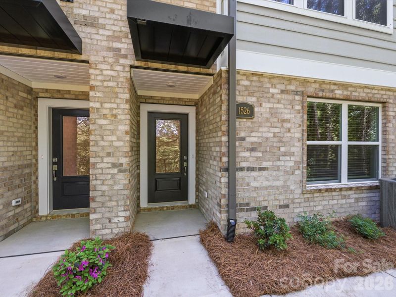 Exterior details and patio area of a home in Central Living at Craig, Charlotte (Image 1). Exterior details and patio area of a home in Central Living at Craig, Charlotte (Image 1).