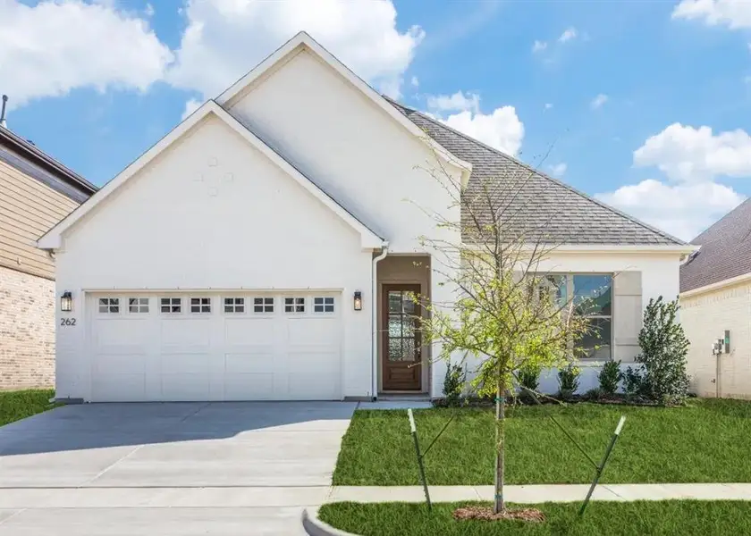 Front exterior of a new home in , Aledo, TX, highlighting curb appeal (Image 1). Front exterior of a new home in , Aledo, TX, highlighting curb appeal (Image 1).