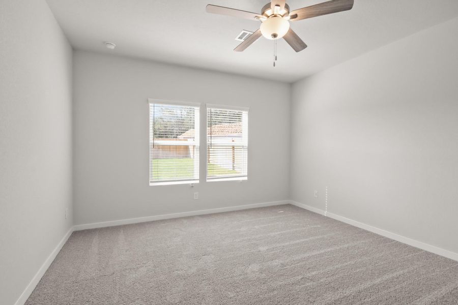 Spacious, unfurnished interior of a new home in Lakes at Crockett Martin, Conroe (Image 8).