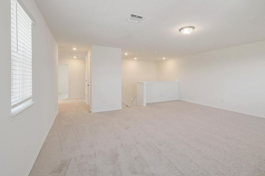 Spacious, unfurnished interior of a new home in Mustang Valley, Manor (Image 17). Spacious, unfurnished interior of a new home in Mustang Valley, Manor (Image 17).