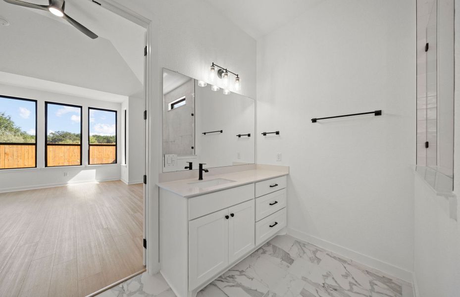 Representative furnished interior of a home built from the Dobbin by Pulte Homes in 6 Creeks, Kyle (Image 10).