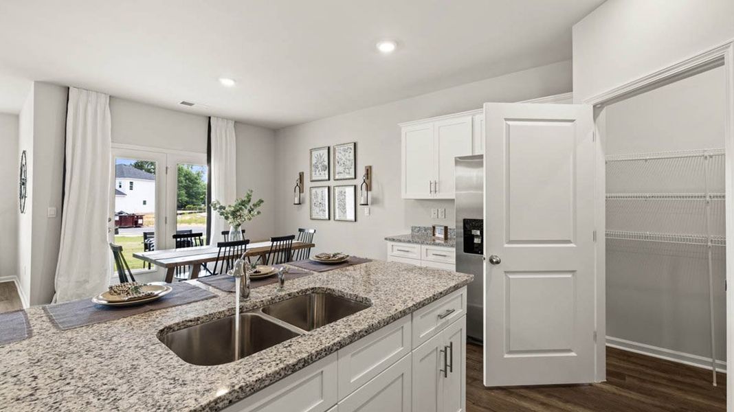 Representative furnished interior of a home built from the Plan by D.R. Horton in Wrenfield at Chanticleer, North Augusta (Image 14). Representative furnished interior of a home built from the Plan by D.R. Horton in Wrenfield at Chanticleer, North Augusta (Image 14).