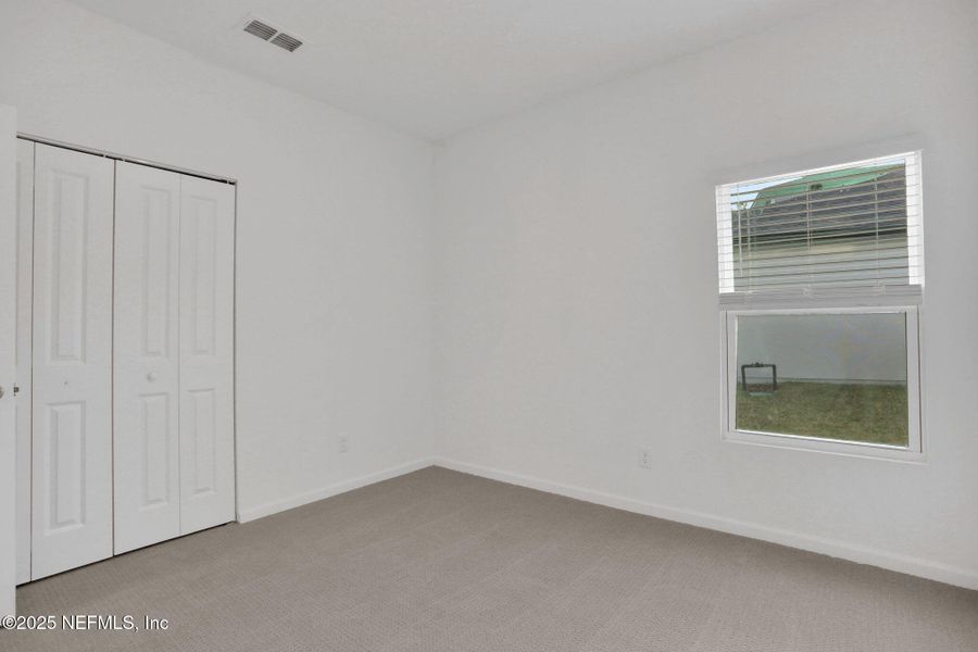 Spacious, unfurnished interior of a new home in Cordova Palms, St. Augustine (Image 41).
