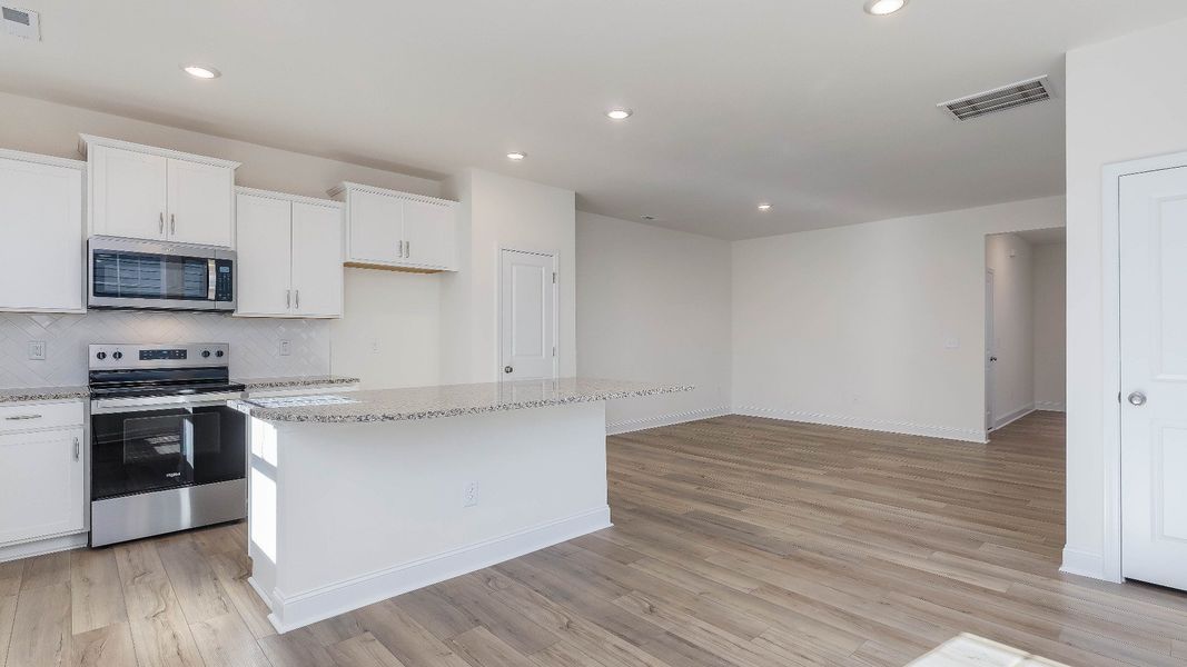 Furnished interior view inside a new home in Battle Bridge, Raleigh (Image 4).