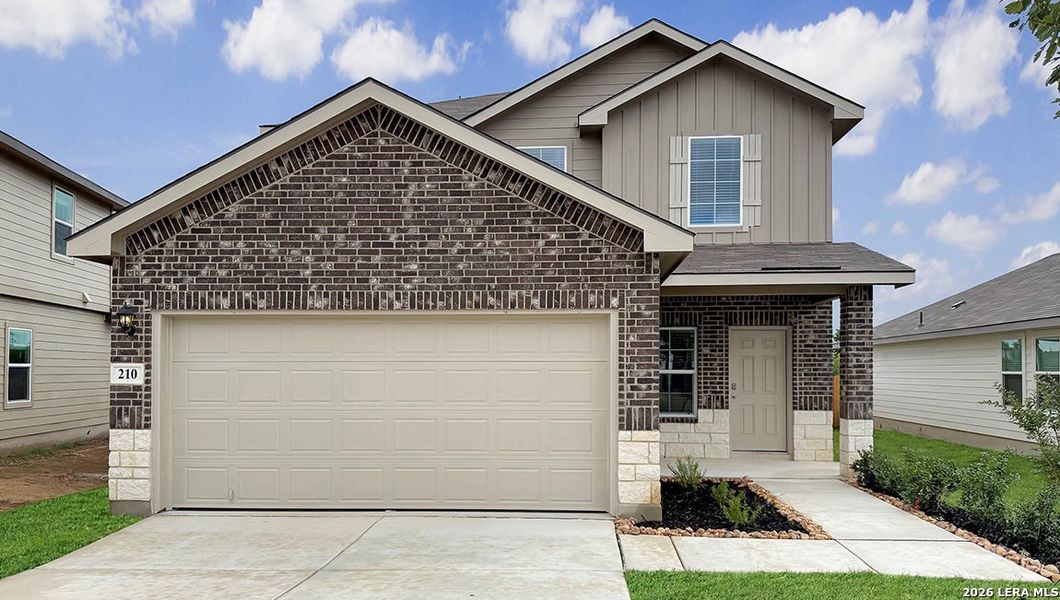 Front exterior of a new home in Redbird Ranch, San Antonio, TX, highlighting curb appeal (Image 2). Front exterior of a new home in Redbird Ranch, San Antonio, TX, highlighting curb appeal (Image 2).