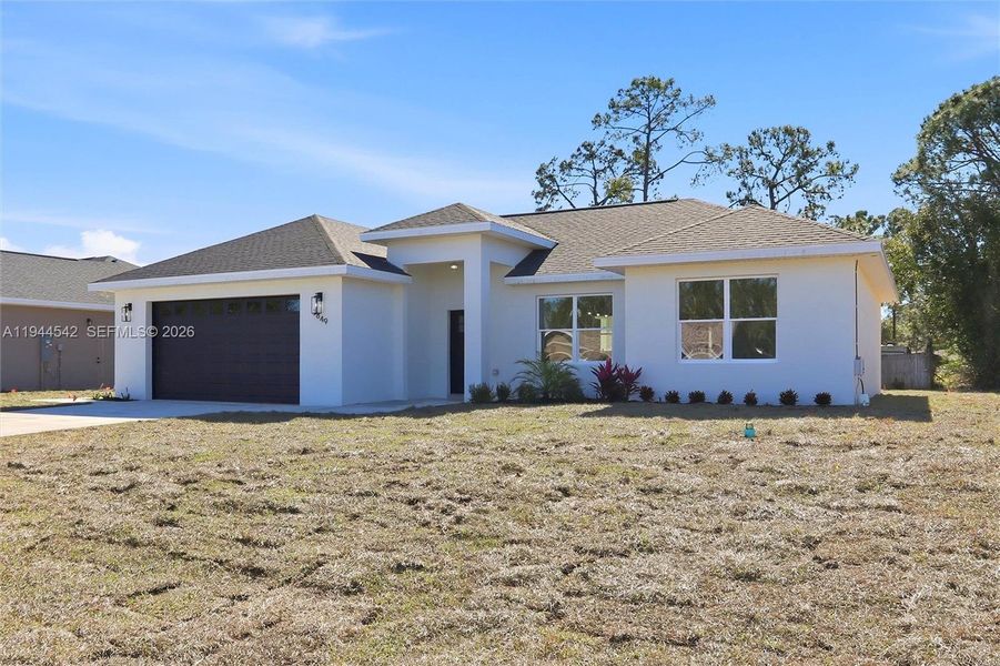 Front exterior of a new home in , Sebring, FL, highlighting curb appeal (Image 16).