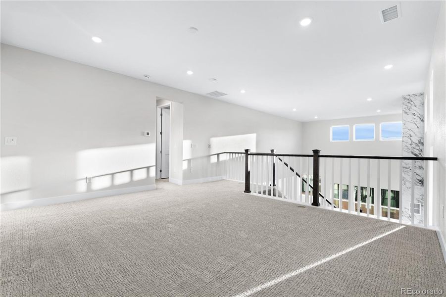 Spacious, unfurnished interior of a new home in Stargaze at Solstice, Littleton (Image 33).