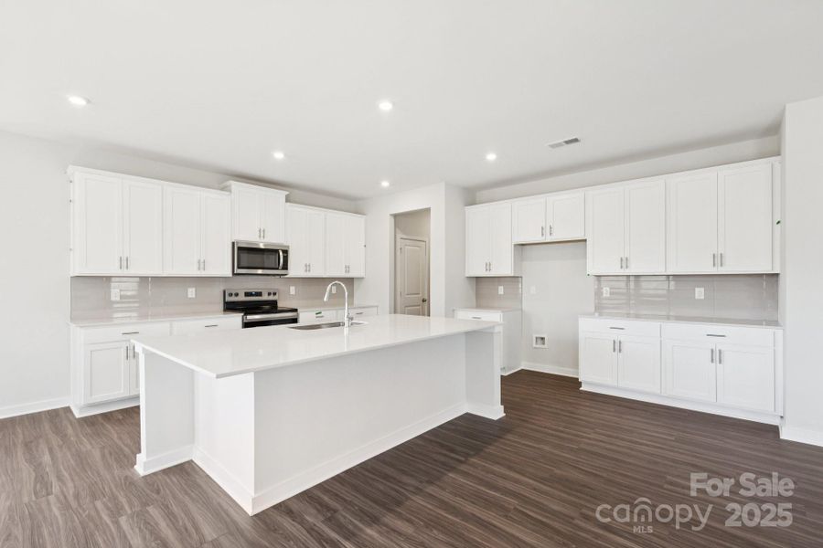 Furnished interior view inside a new home in Running Creek, Locust (Image 6).