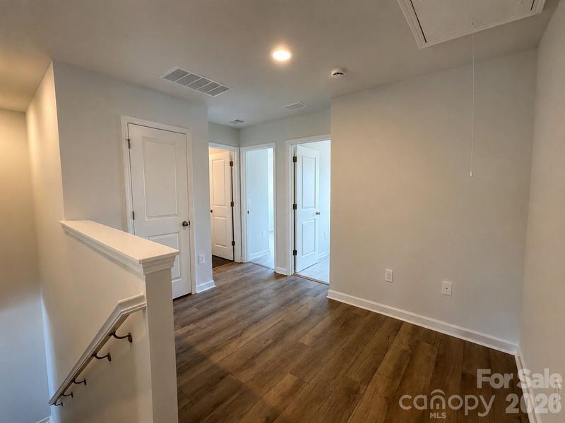 LVP Steps lead to an open loft