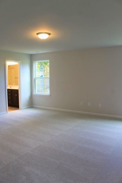 Spacious, unfurnished interior of a new home in The Wilcox, Greensboro (Image 19).
