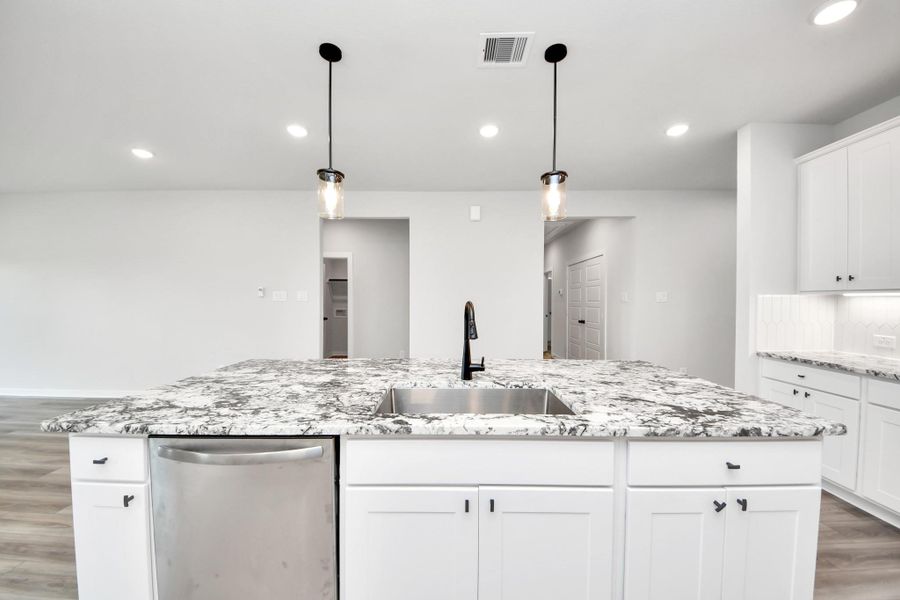 Furnished interior view inside a new home in Sundance Cove, Crosby (Image 6).
