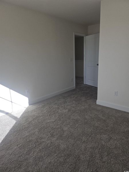 Spacious, unfurnished interior of a new home in Avery Woods, Longs (Image 25).