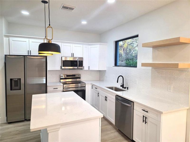 Furnished interior view inside a new home in , North Port (Image 4).