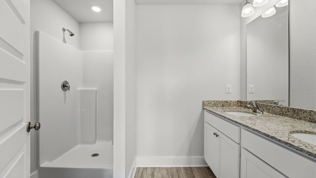 Furnished interior view inside a new home in Chateau Nemours, Port Saint Joe (Image 13).