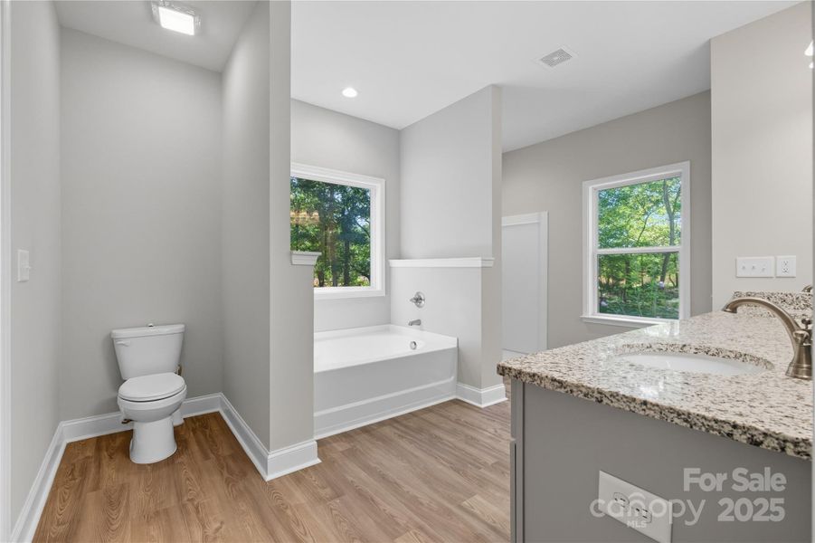 Furnished interior view inside a new home in , Wingate (Image 10).