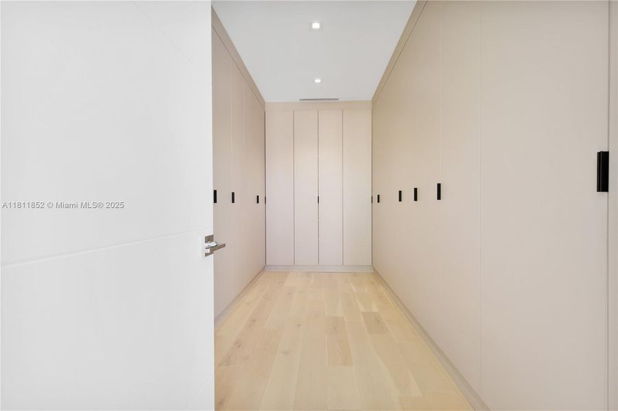 Master bedroom walk in closet. Master bedroom walk in closet.