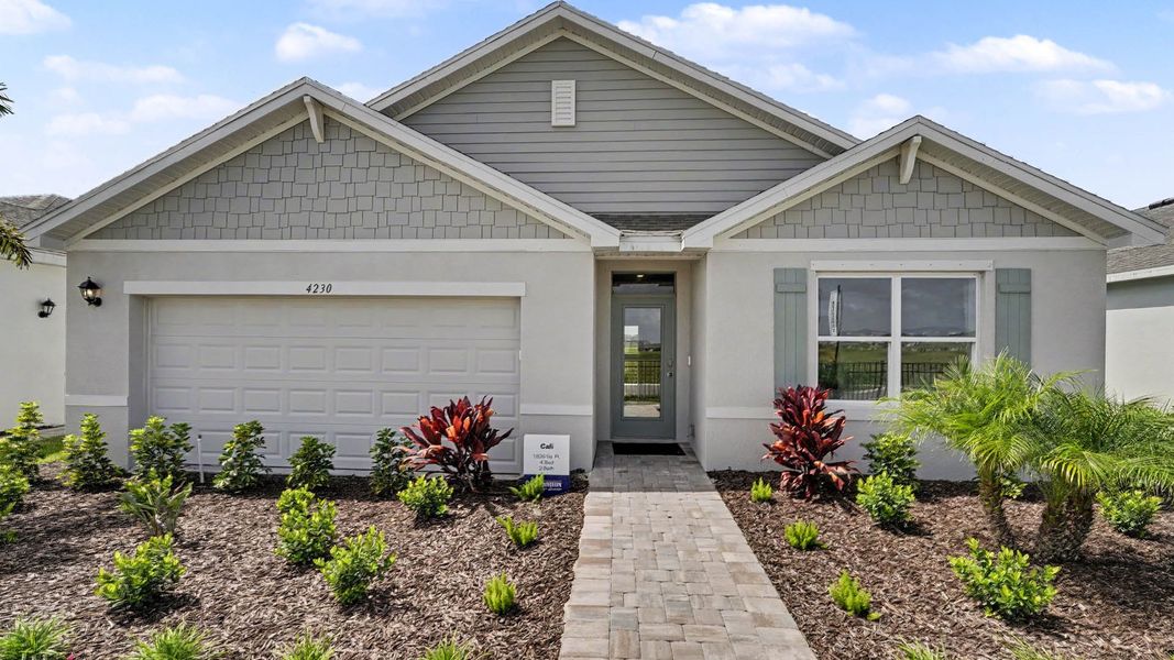 Representative exterior photo of a completed home built from the Cali by D.R. Horton in Cypress Bay West, Palm Bay, FL (Image 1). Representative exterior photo of a completed home built from the Cali by D.R. Horton in Cypress Bay West, Palm Bay, FL (Image 1).