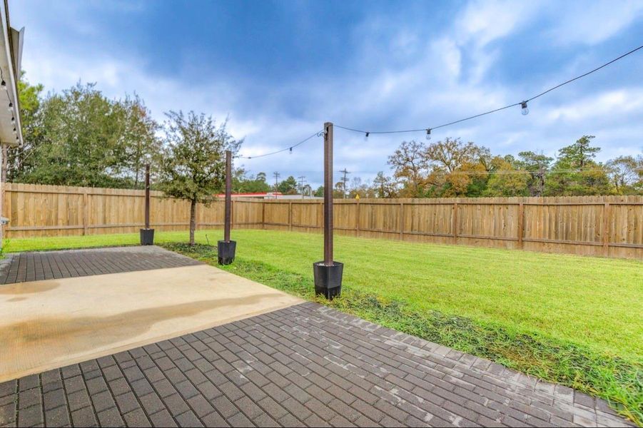 Exterior details and patio area of a home in Williams Trace, Magnolia (Image 3).