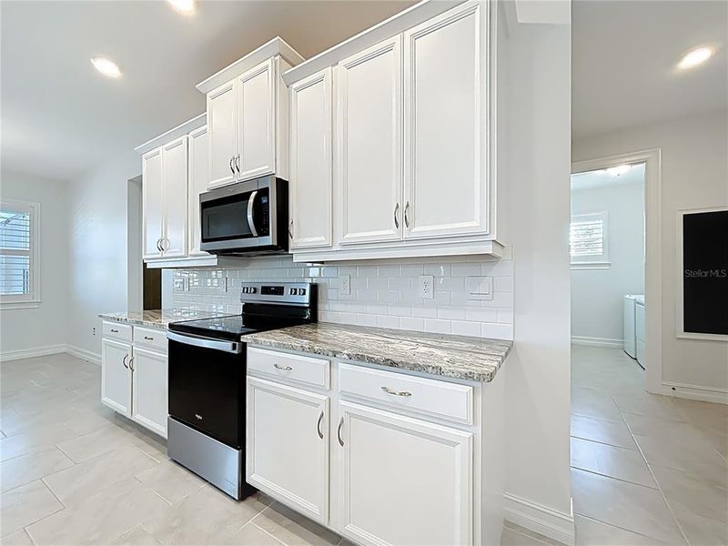Furnished interior view inside a new home in , Port Charlotte (Image 12).