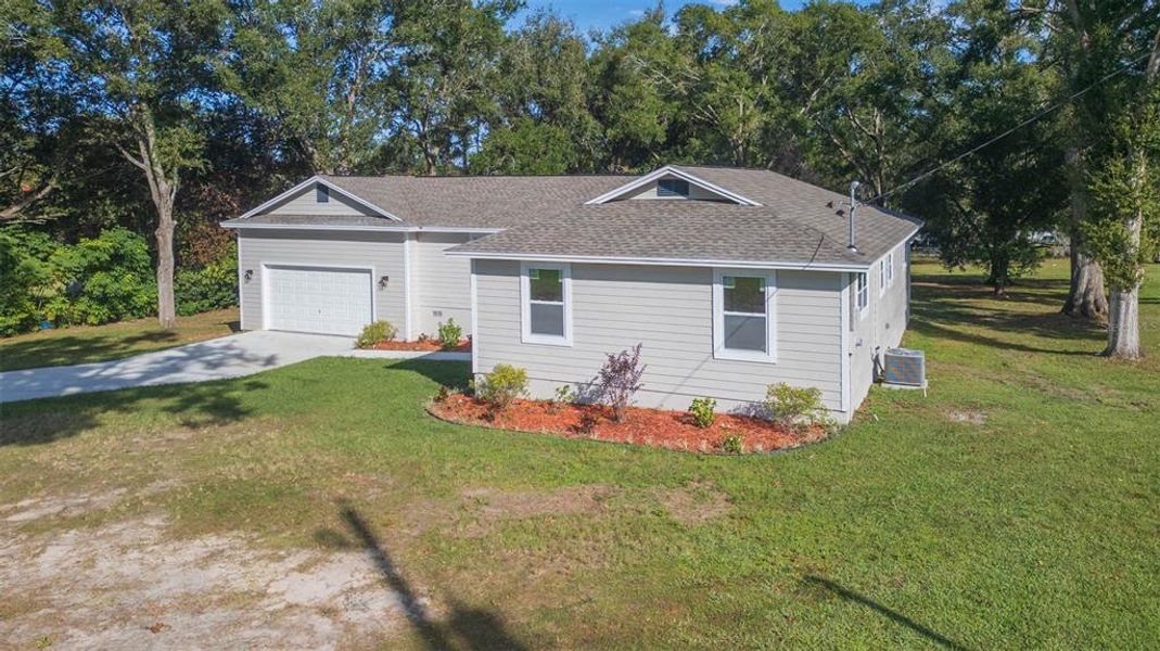 Front exterior of a new home in , Dade City, FL, highlighting curb appeal (Image 21).