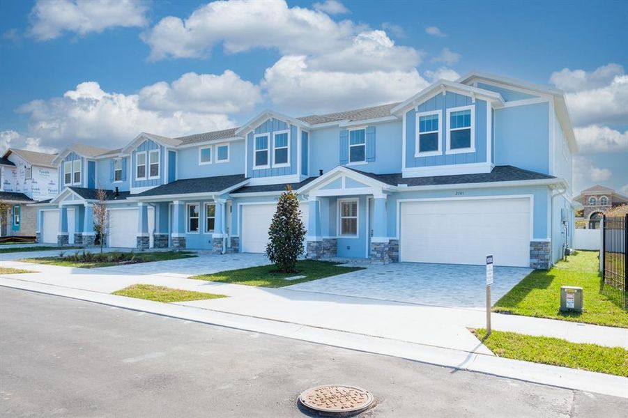 Front exterior of a new home in , Clearwater, FL, highlighting curb appeal (Image 4).