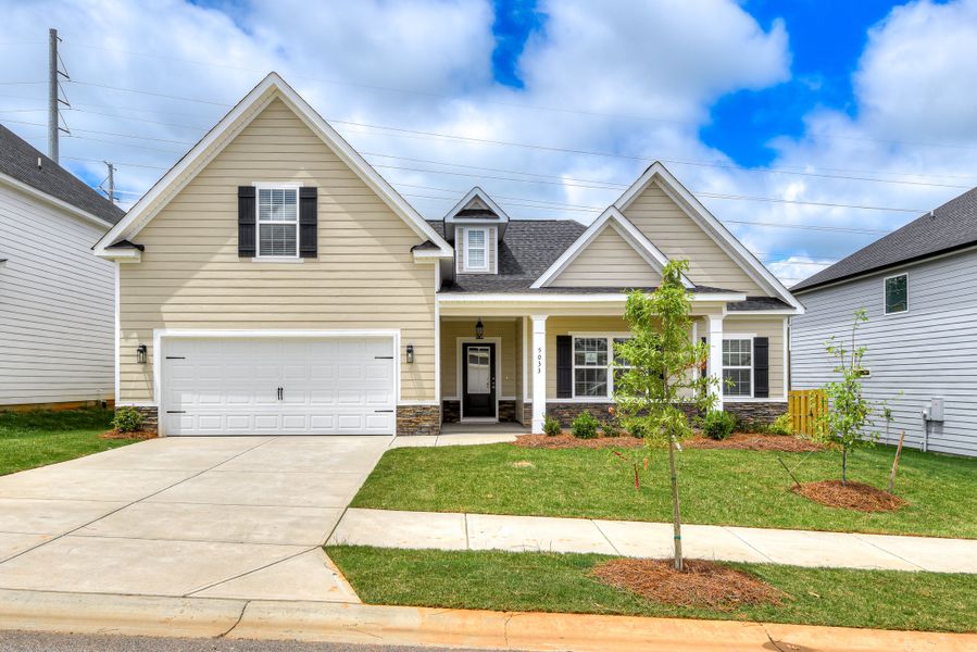 Front exterior of a new home in The Sanctuary, Aiken, SC, highlighting curb appeal (Image 1). Front exterior of a new home in The Sanctuary, Aiken, SC, highlighting curb appeal (Image 1).