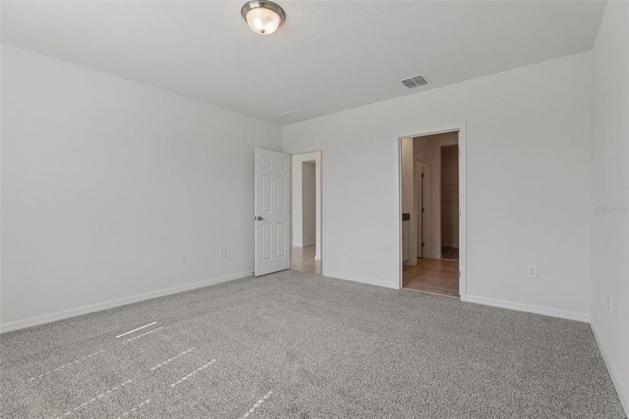 Spacious, unfurnished interior of a new home in Lawson Dunes - Signature Series, Haines City (Image 33). Spacious, unfurnished interior of a new home in Lawson Dunes - Signature Series, Haines City (Image 33).