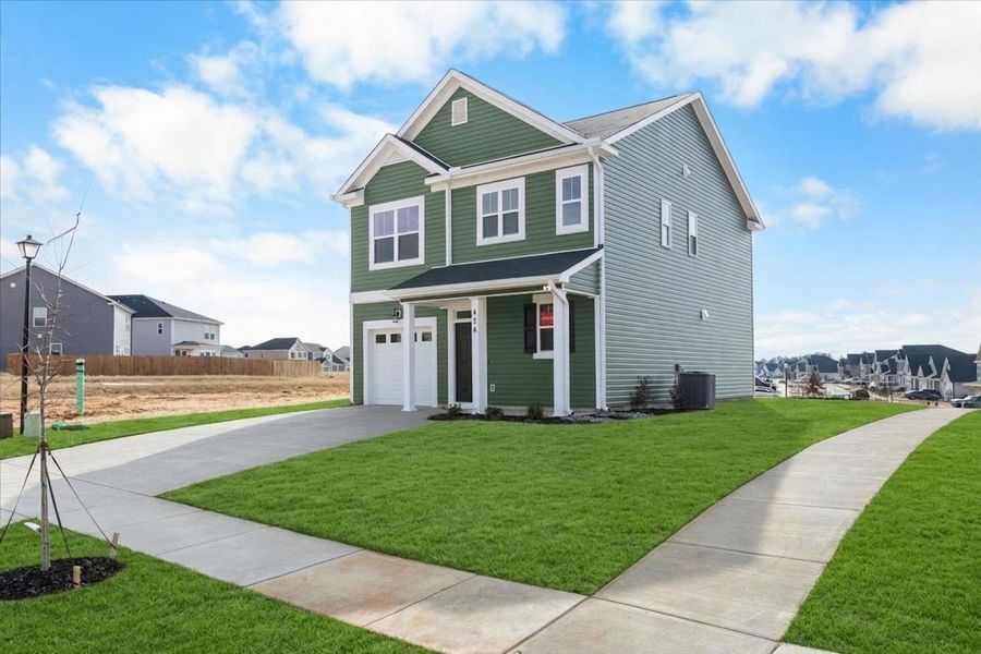 Front exterior of a new home in Windsor, North Augusta, SC, highlighting curb appeal (Image 2). Front exterior of a new home in Windsor, North Augusta, SC, highlighting curb appeal (Image 2).
