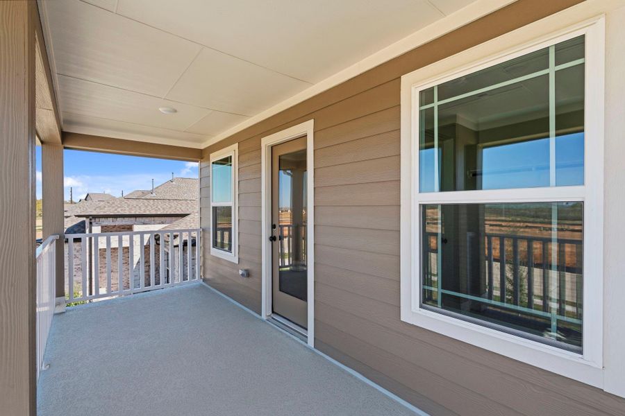 The balcony offers a relaxing outdoor space perfect for morning coffee or unwinding in the evening.
